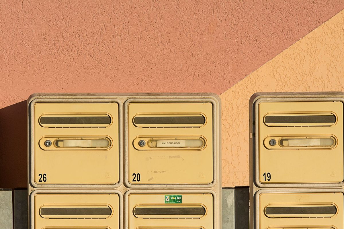 Mailbox Lock Change — Bank of apartment mailboxes with individual locks