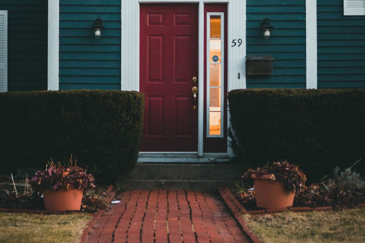 Residential Locksmith in Montreal, Laval and Longueuil — Residential front door with a deadbolt on a Montreal duplex